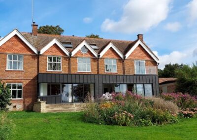 ZINC CLAD EXTENSION TO RIVERSIDE HOME, OXFORDSHIRE